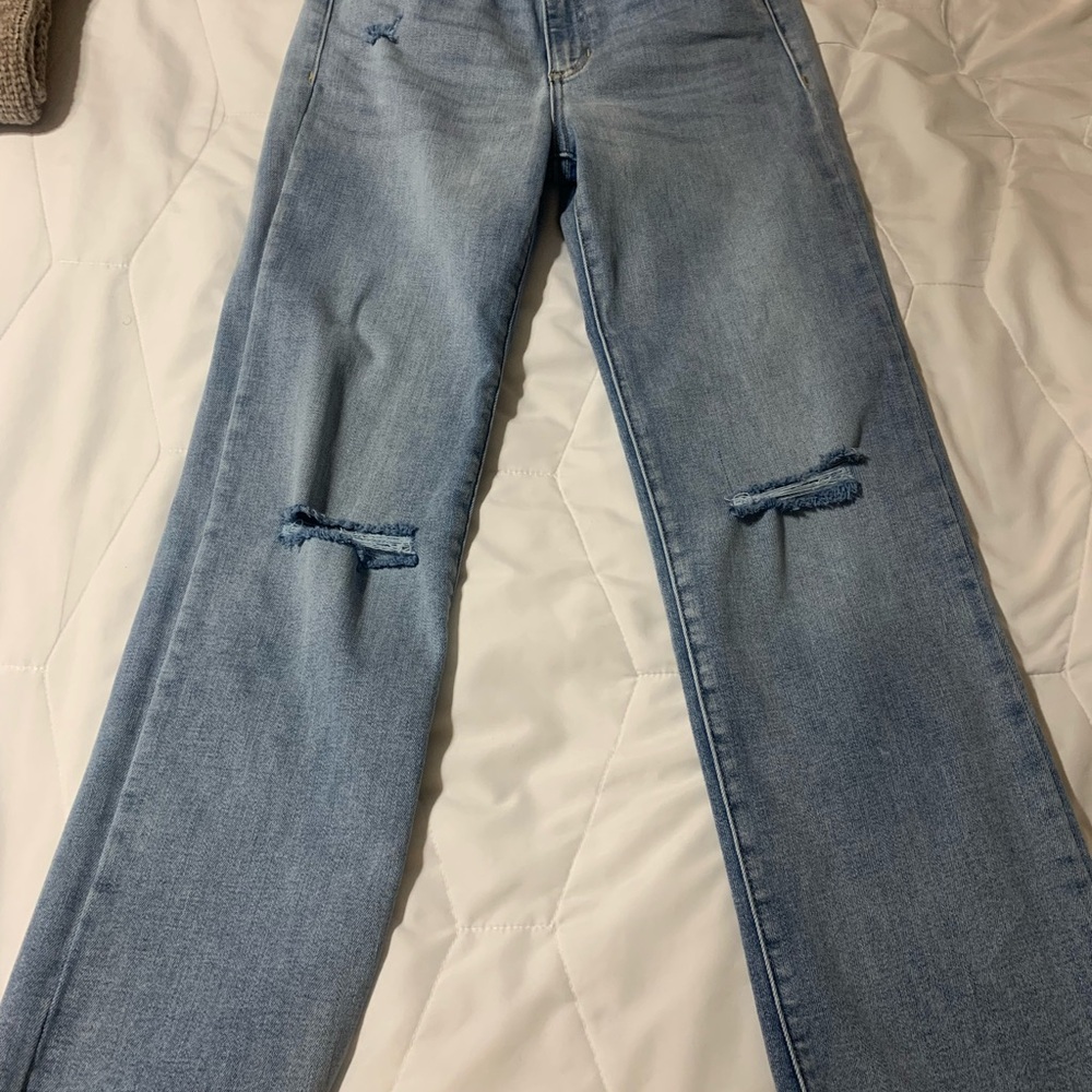 Women's Light Blue Distressed Jeans